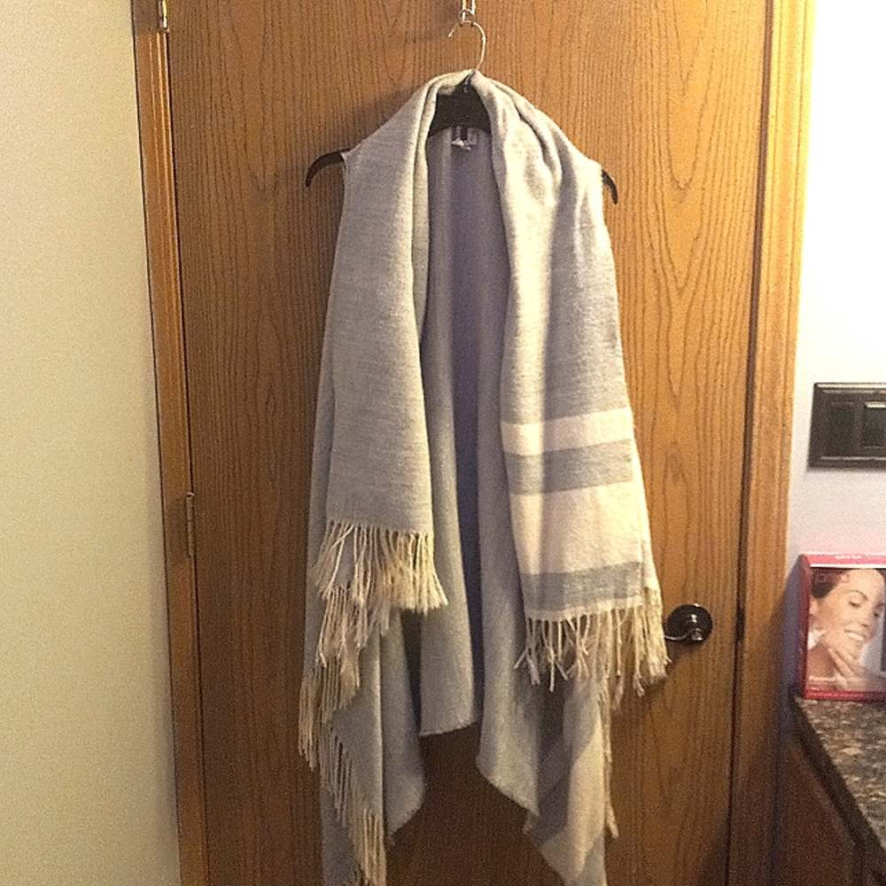 White & oatmeal colored blanket vest